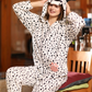Women's jumpsuit dotted with cape