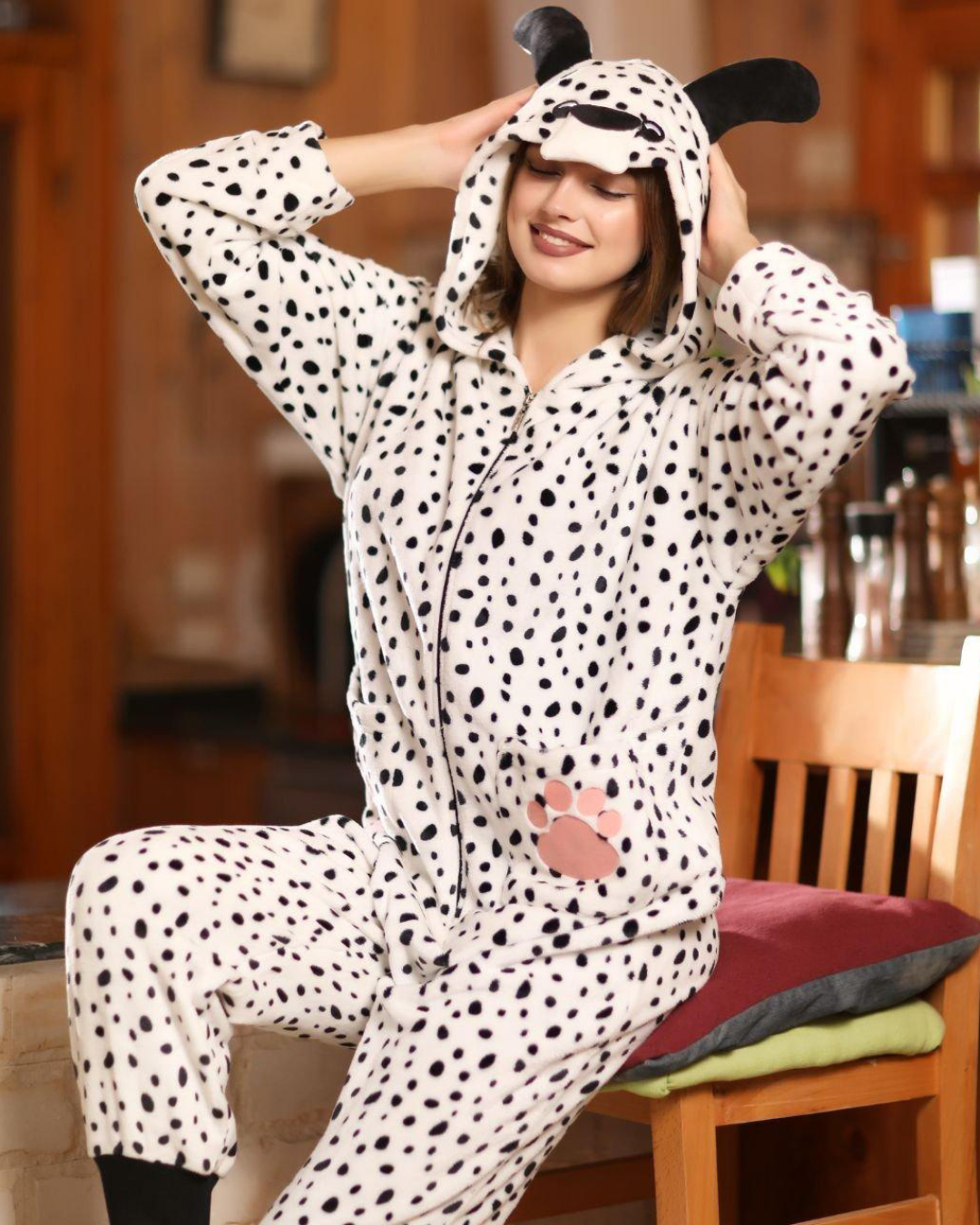 Women's jumpsuit dotted with cape