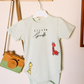 Children's romper with a cute giraffe print