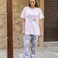 Women's pajamas, half sleeves, polo pants, and a flower