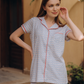 Classic women's pajamas with buttons, a pocket on the chest