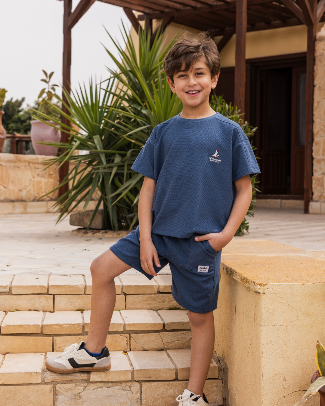 بيجاما شورت جاكارد و توب نص كُم الكابتن الصغير