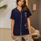 Women's pajamas, printed long trousers, buttoned T-shirt with hearts printed on the word