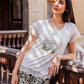 Women's pajamas with a half-sleeved top and a lace print and olive-rose trousers