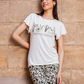 Women's pajamas, half-sleeve fan-print top, and olive-colored floral trousers