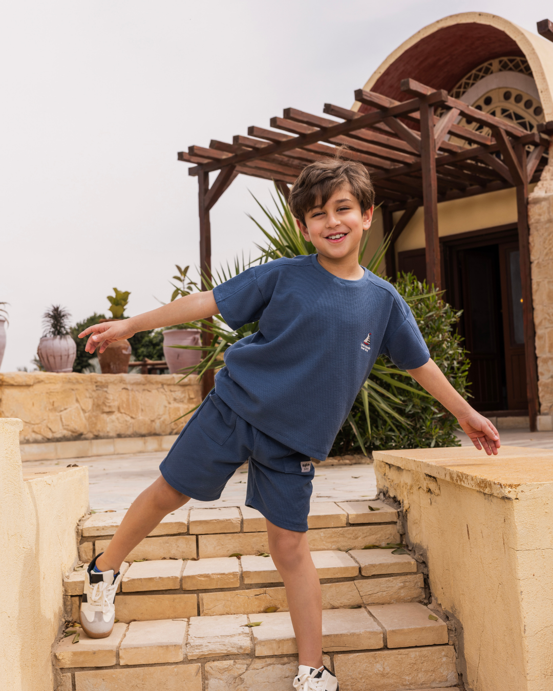 بيجاما شورت جاكارد و توب نص كُم الكابتن الصغير