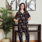 Classic women's pajamas, half sleeves and patterned pants