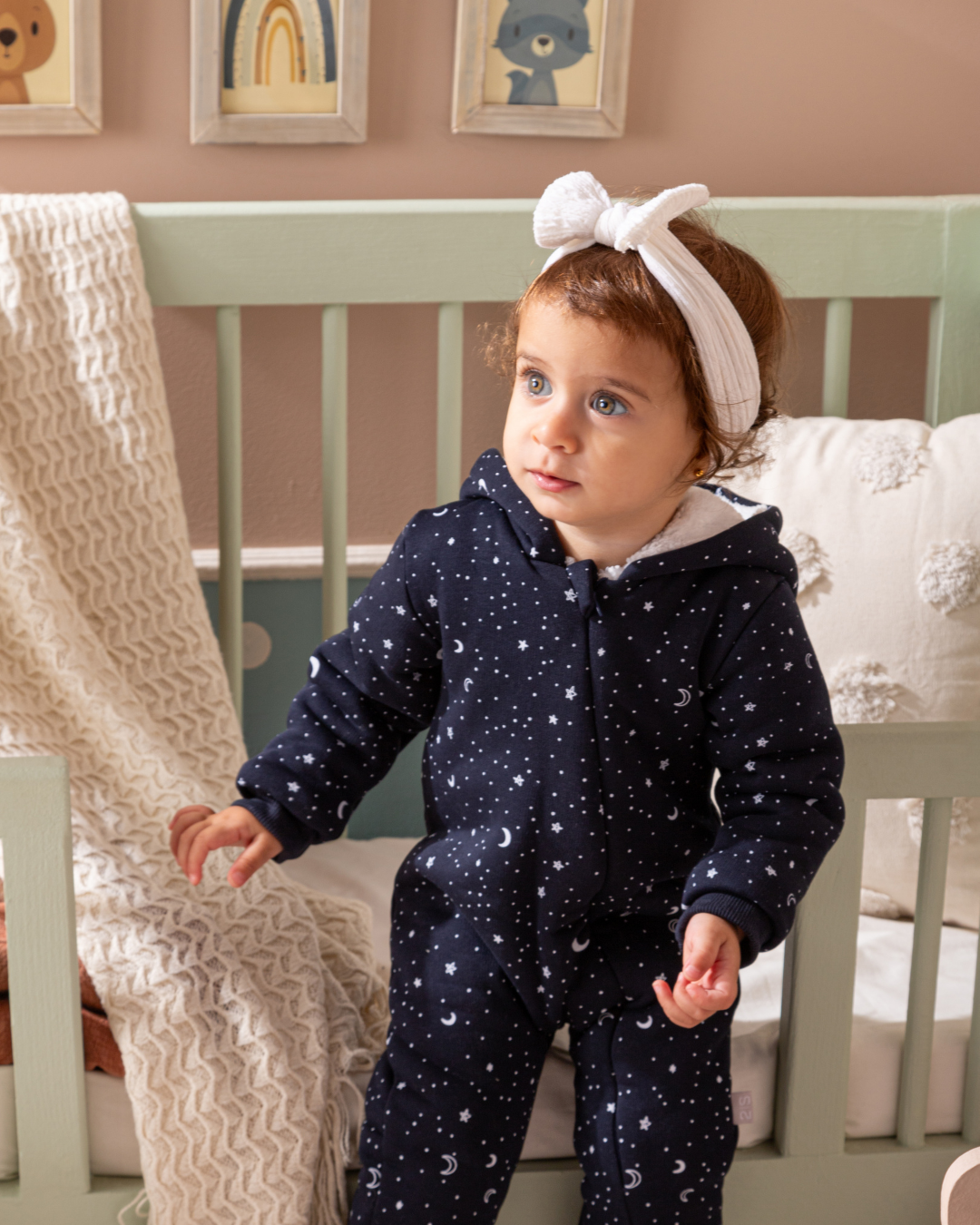 Shine Stars Baby girls zip-up jumpsuit with a fur-lined cabochon