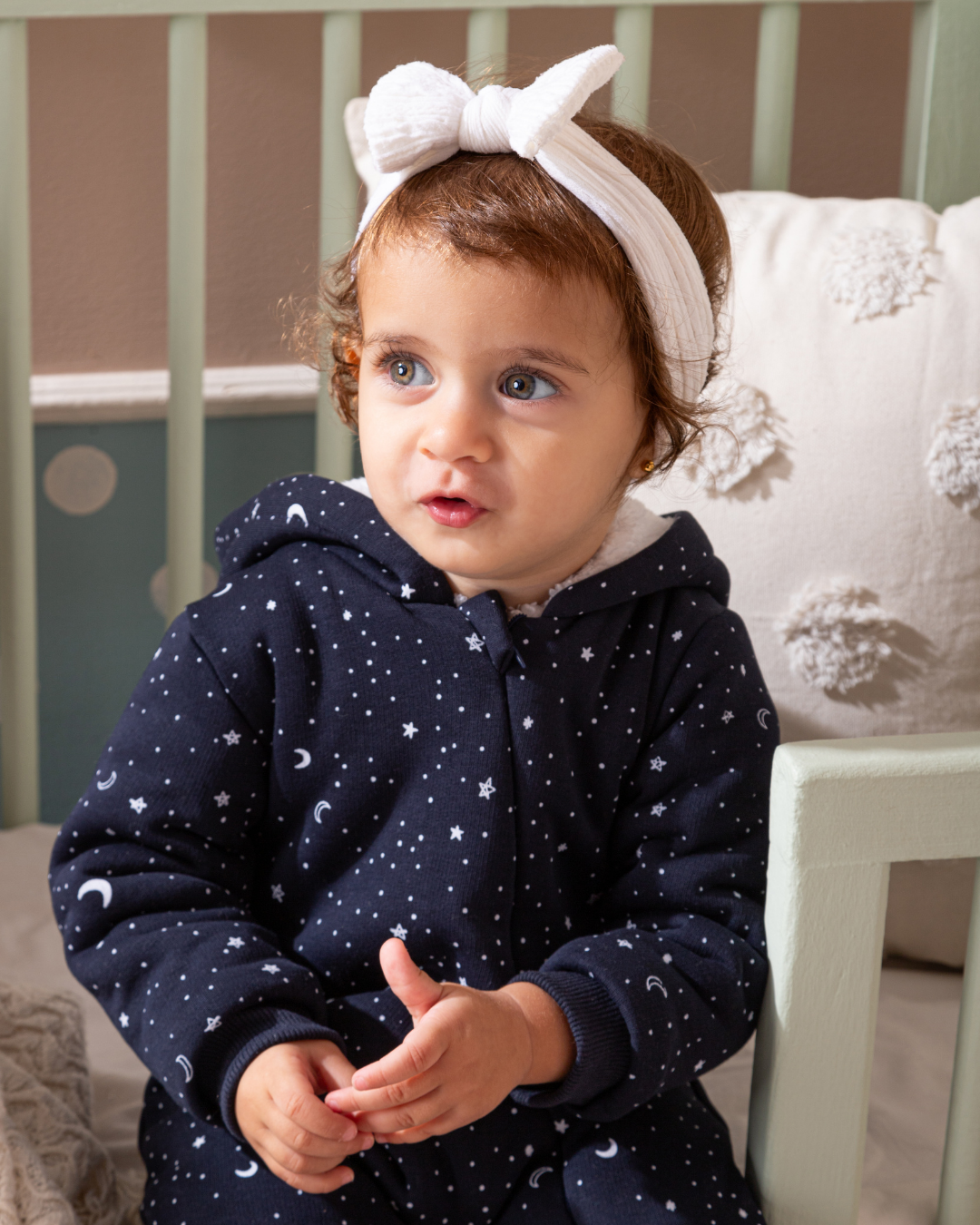 Shine Stars Baby girls zip-up jumpsuit with a fur-lined cabochon