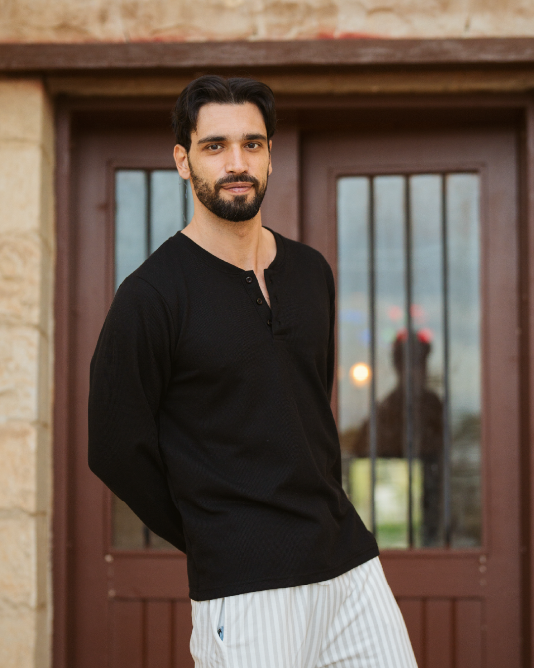Striped men's pajamas with sleeves and buttons
