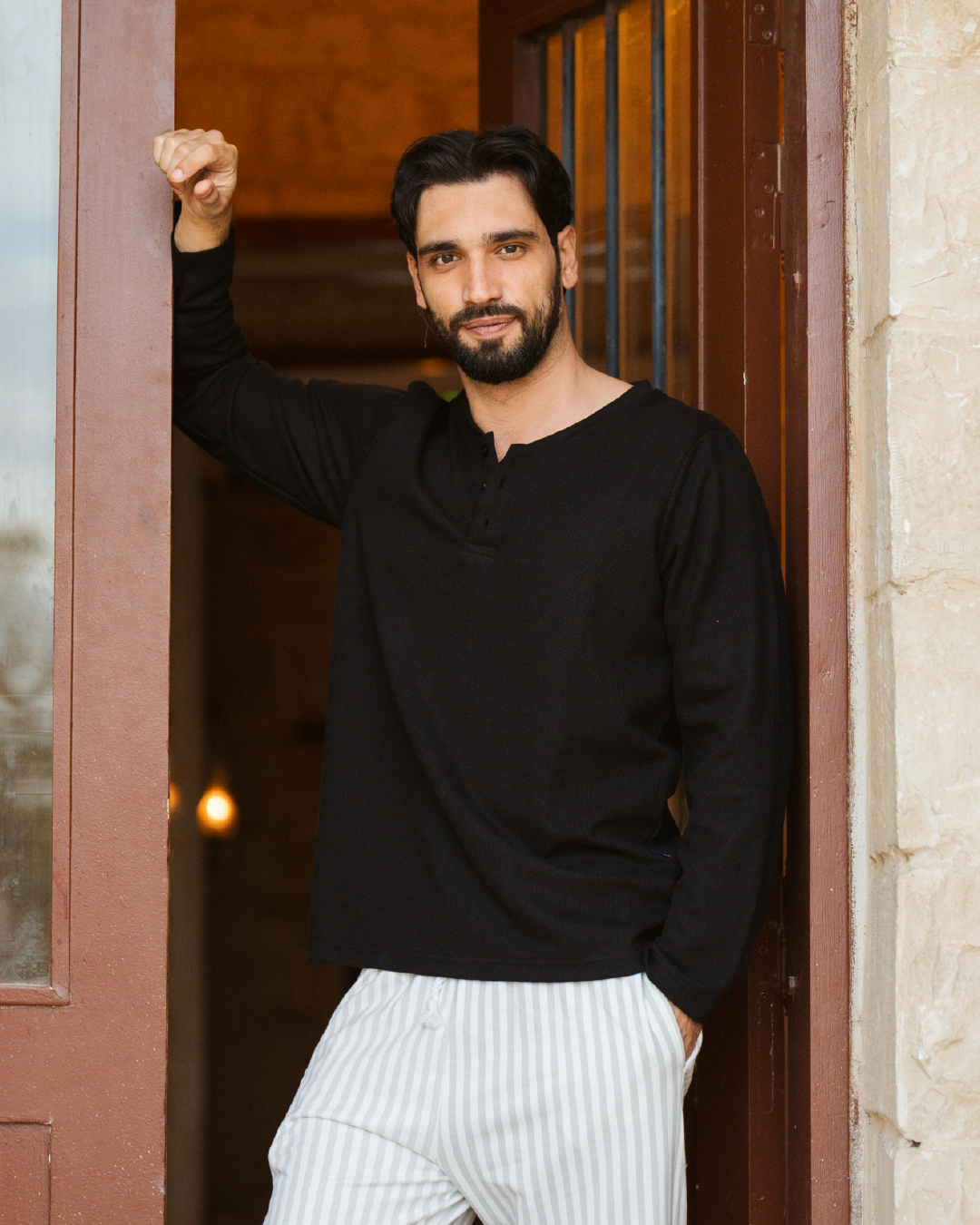 Striped men's pajamas with sleeves and buttons