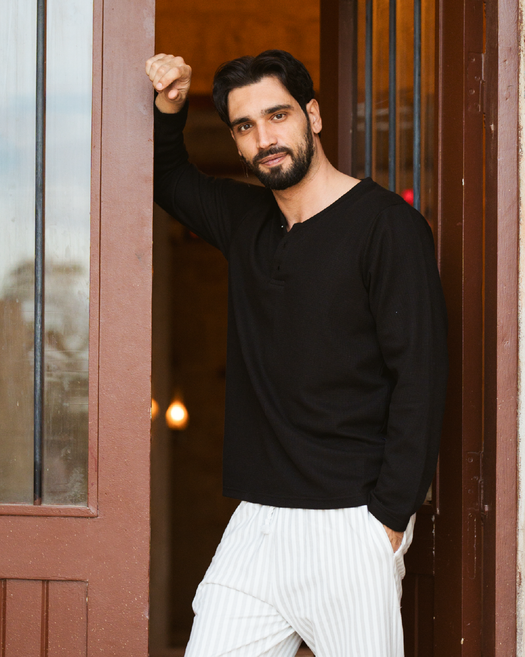 Striped men's pajamas with sleeves and buttons