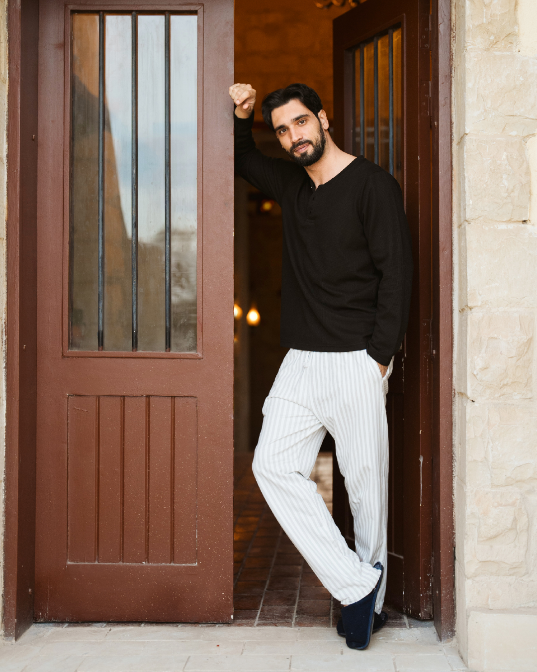 Striped men's pajamas with sleeves and buttons