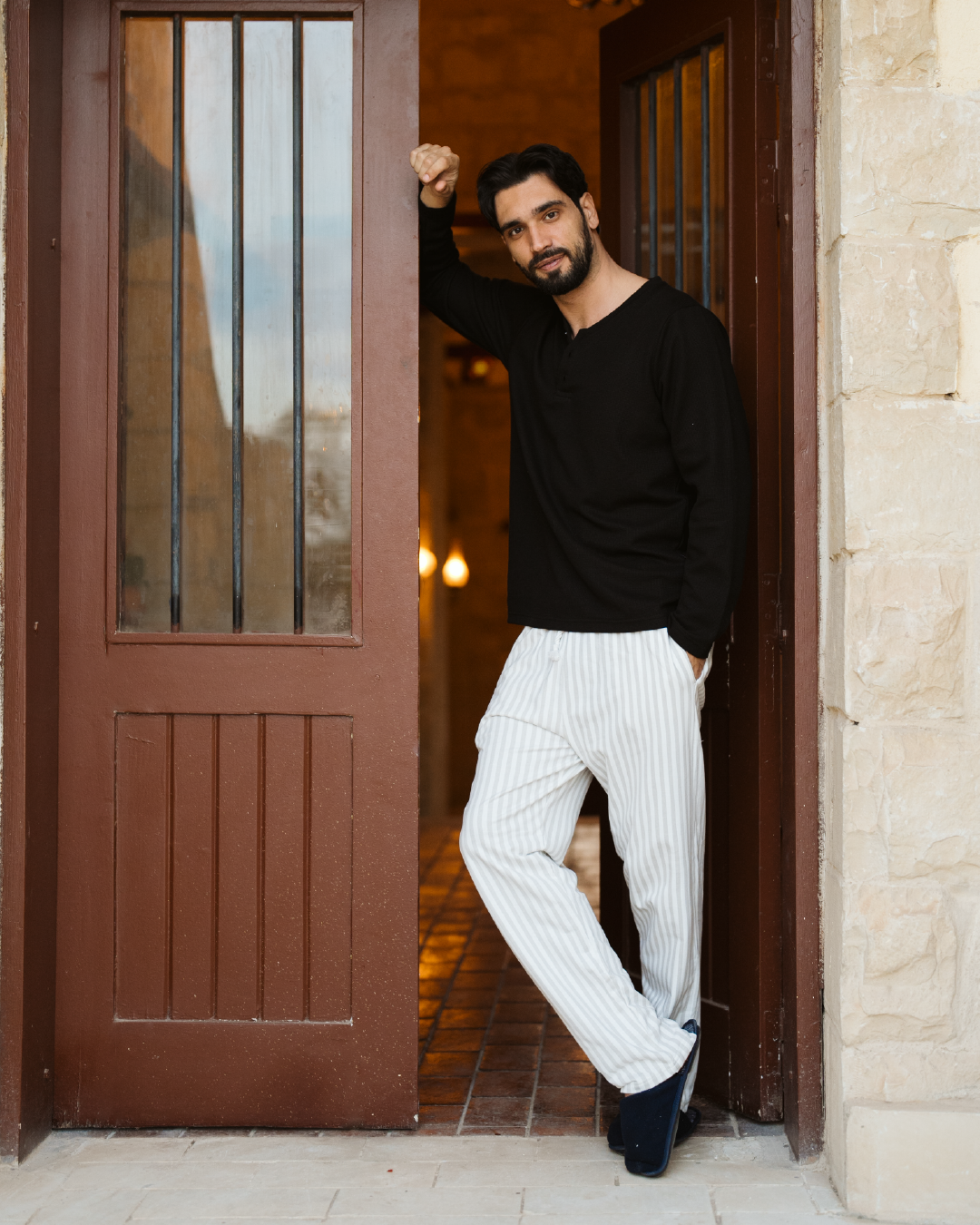 Striped men's pajamas with sleeves and buttons