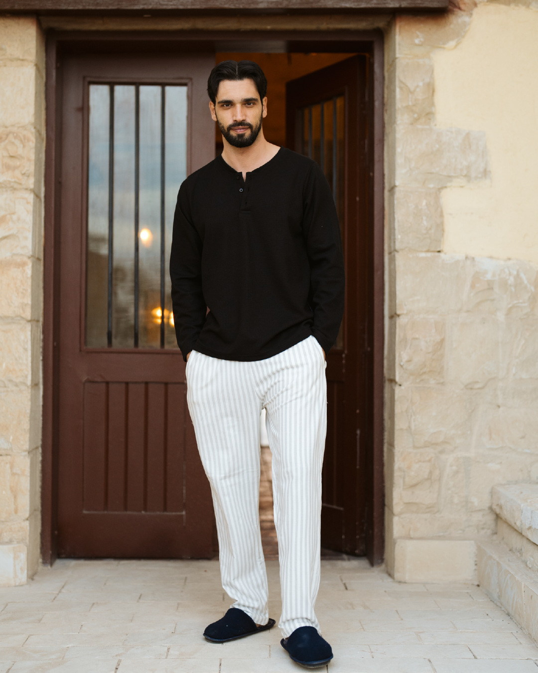 Striped men's pajamas with sleeves and buttons