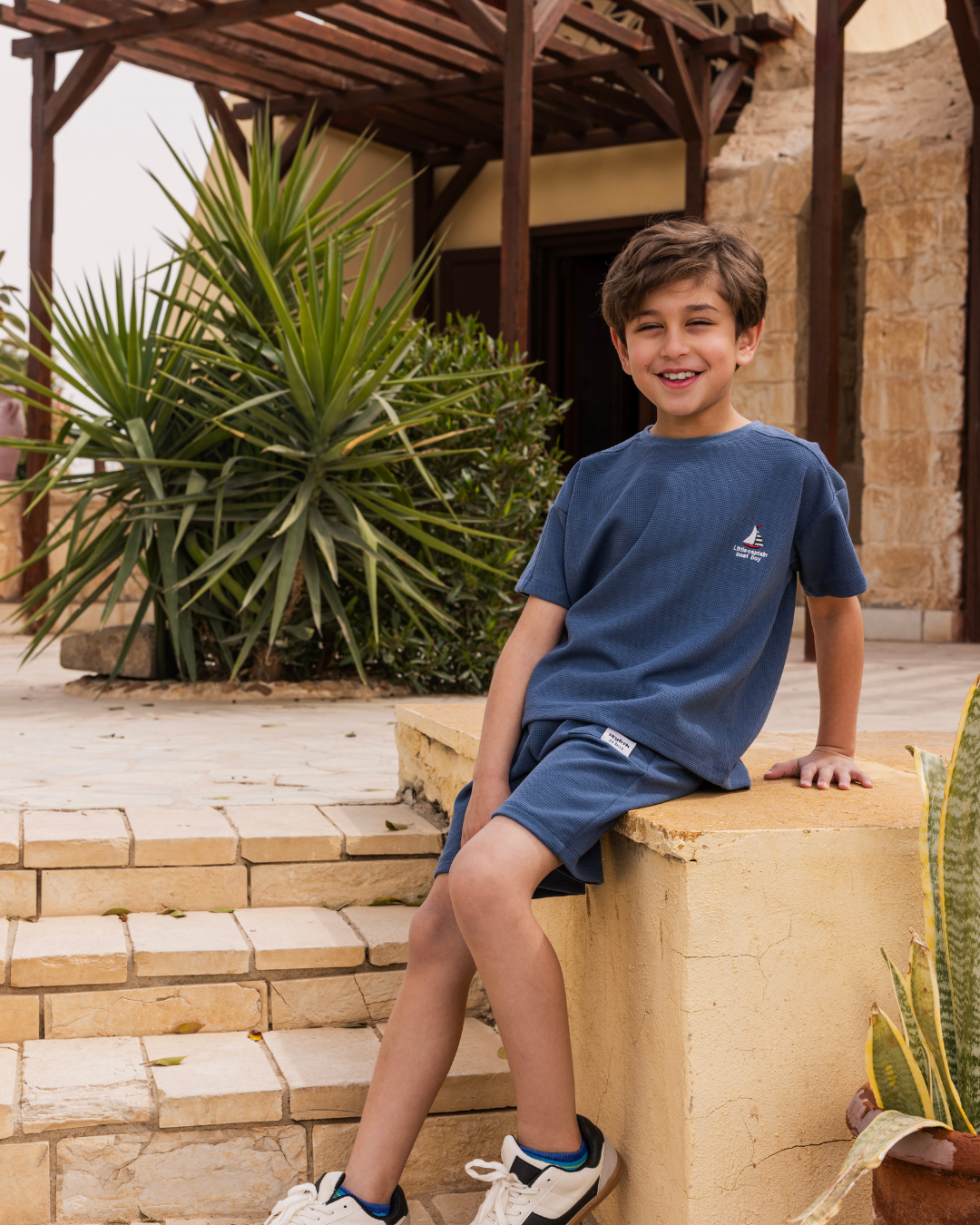 بيجاما شورت جاكارد و توب نص كُم الكابتن الصغير