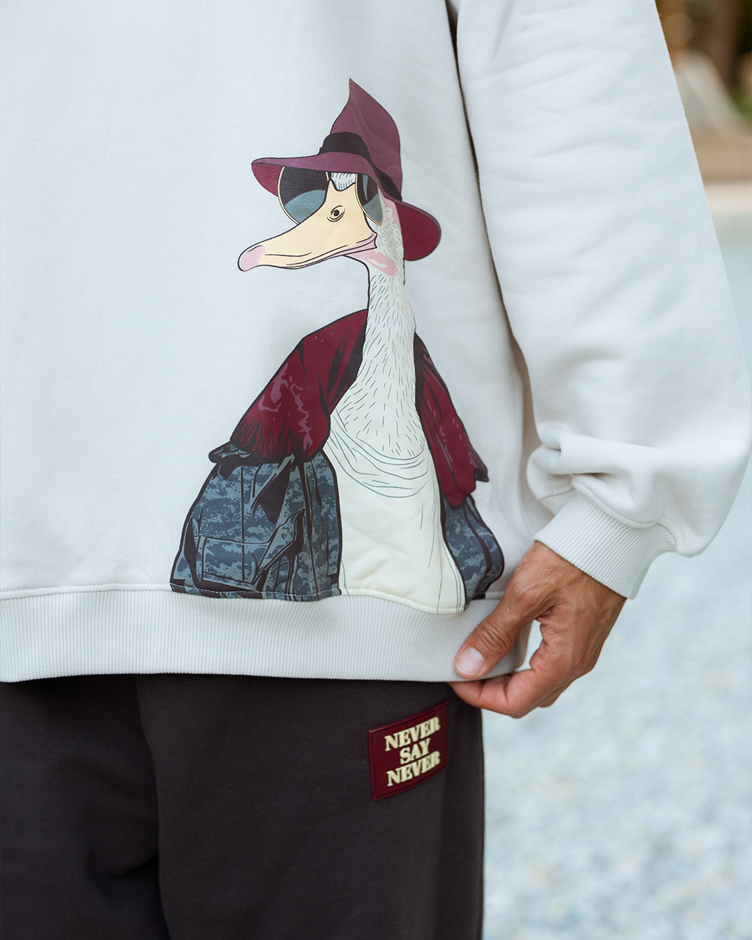 طقم  سويت شيرت بكابيشون و طباعه على الصدر