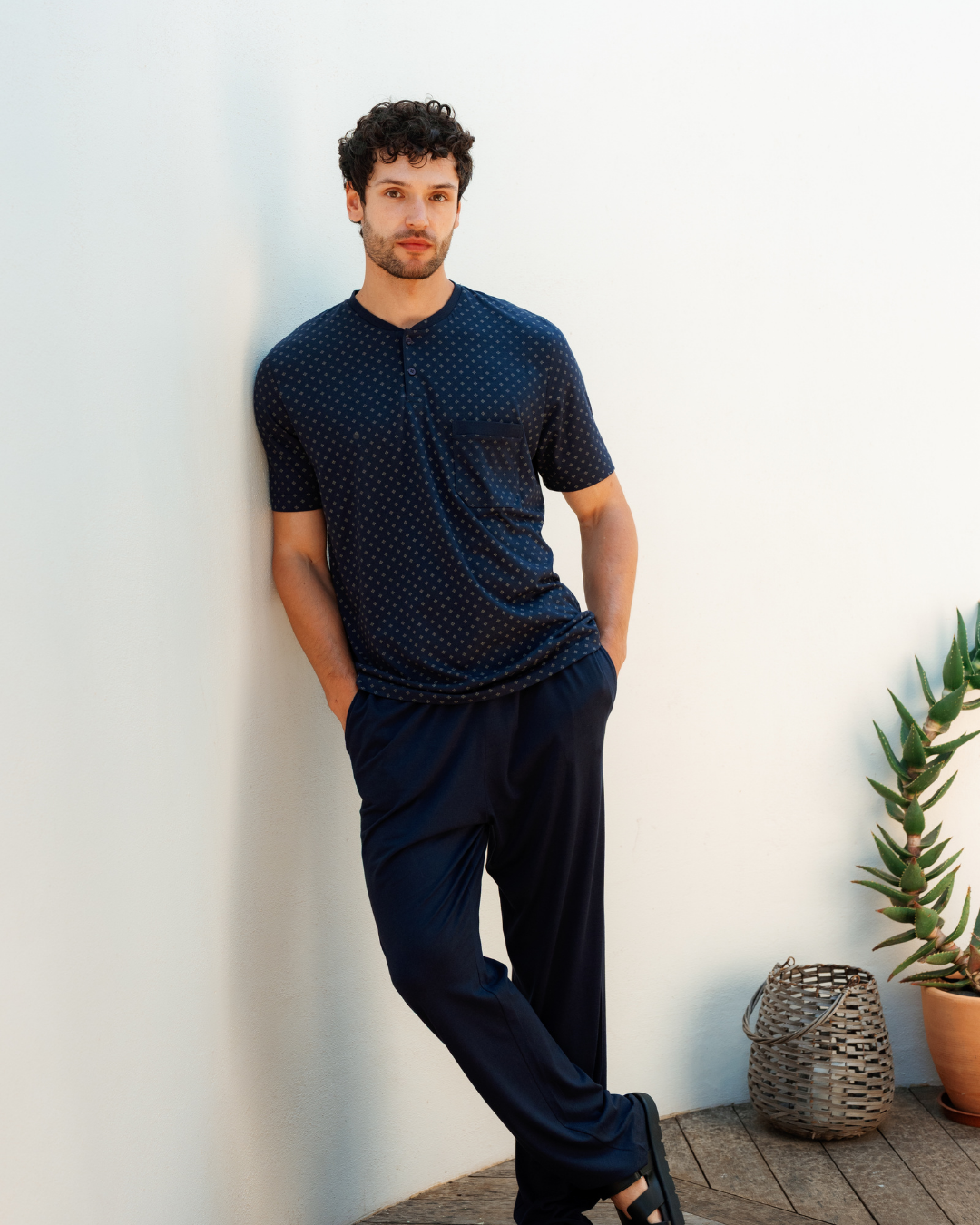Man with an elegant classic look in a pajama with a distinctive geometric pattern