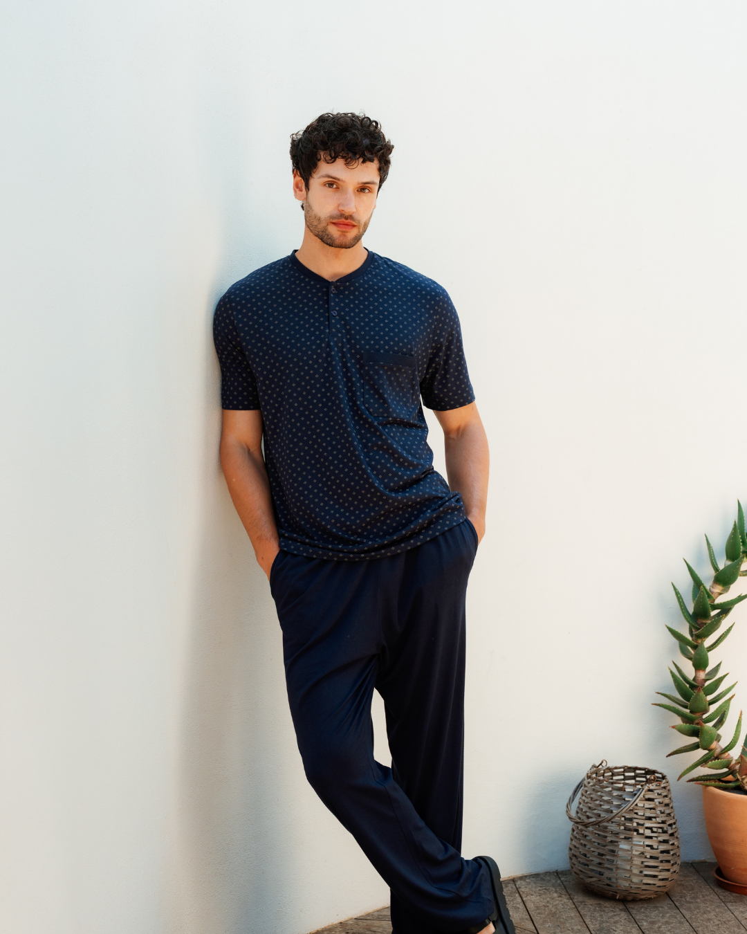 Man with an elegant classic look in a pajama with a distinctive geometric pattern
