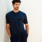 Man with an elegant classic look in a pajama with a distinctive geometric pattern