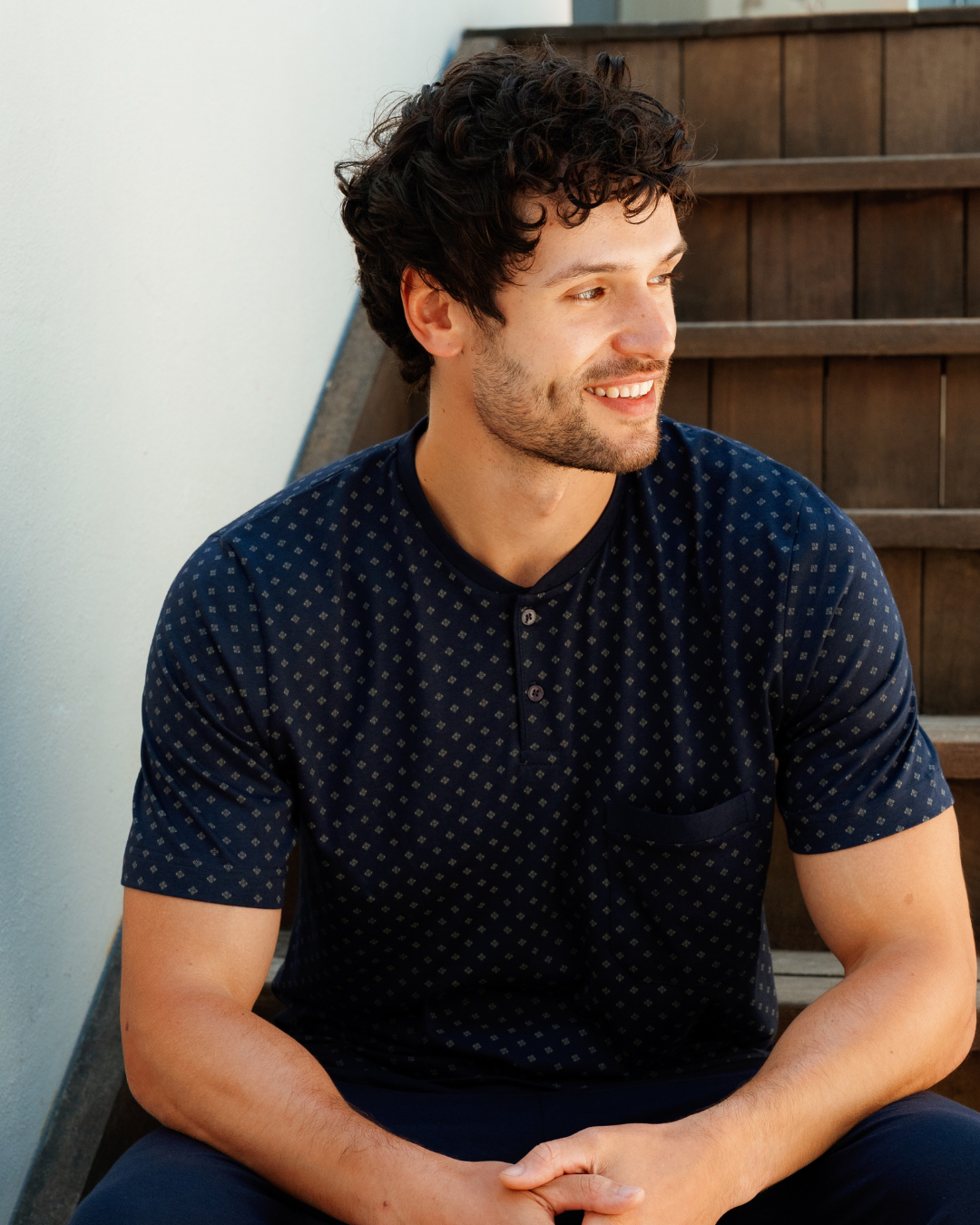 Man with an elegant classic look in a pajama with a distinctive geometric pattern
