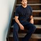 Man with an elegant classic look in a pajama with a distinctive geometric pattern