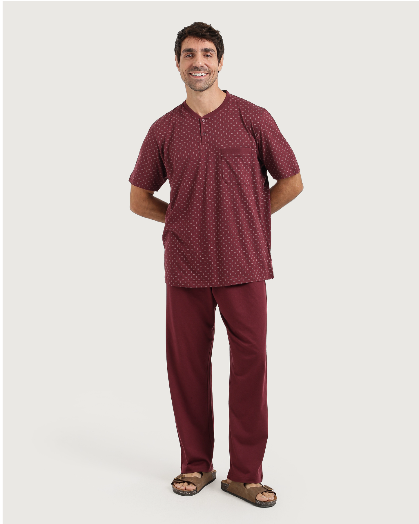 Man with an elegant classic look in a pajama with a distinctive geometric pattern