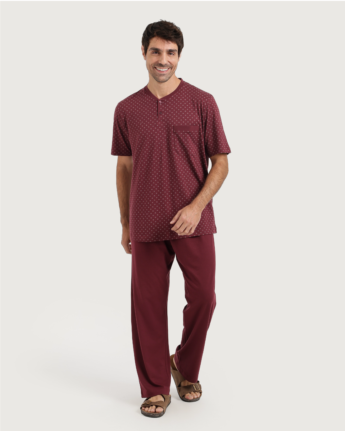Man with an elegant classic look in a pajama with a distinctive geometric pattern