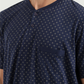Man with an elegant classic look in a pajama with a distinctive geometric pattern