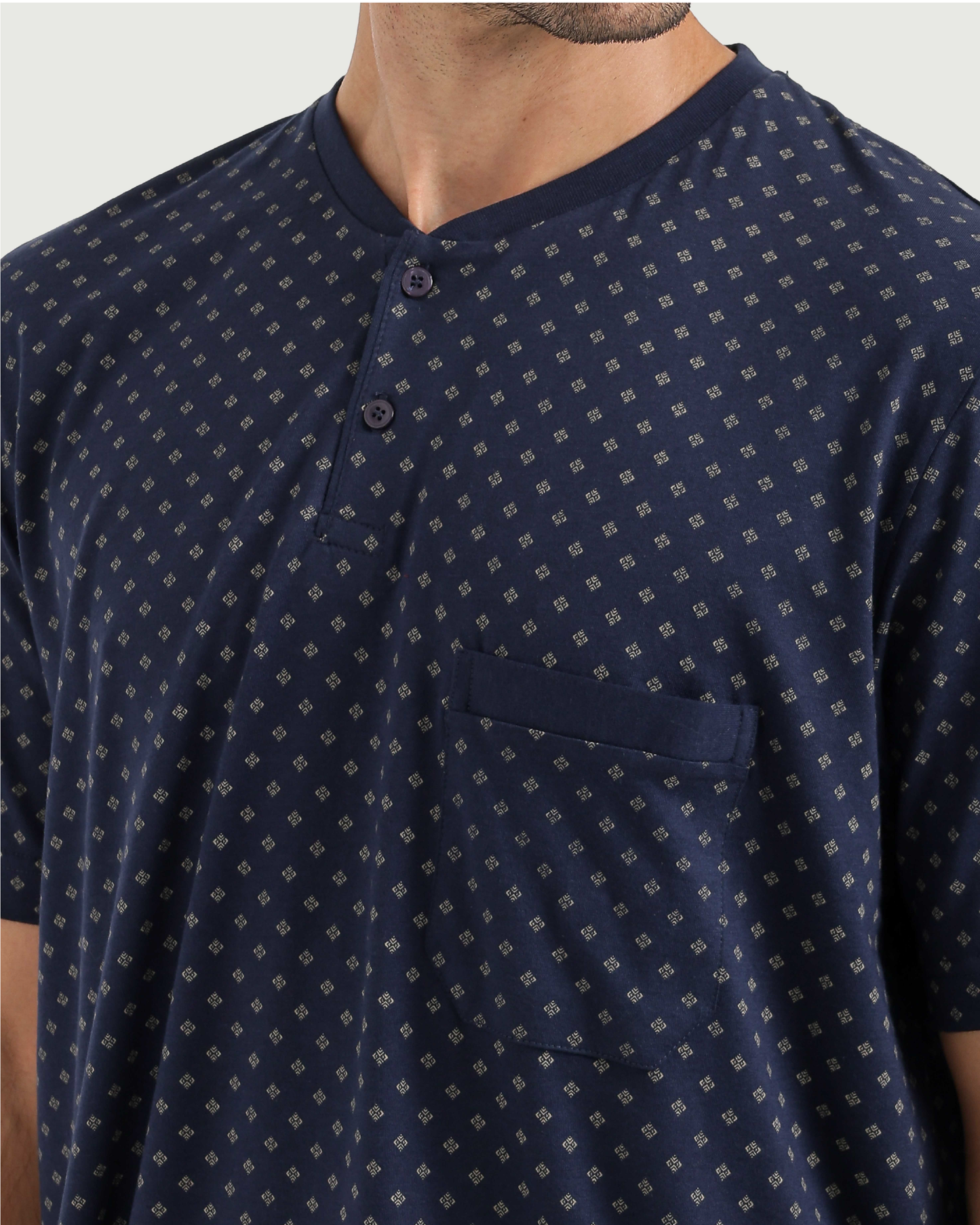Man with an elegant classic look in a pajama with a distinctive geometric pattern