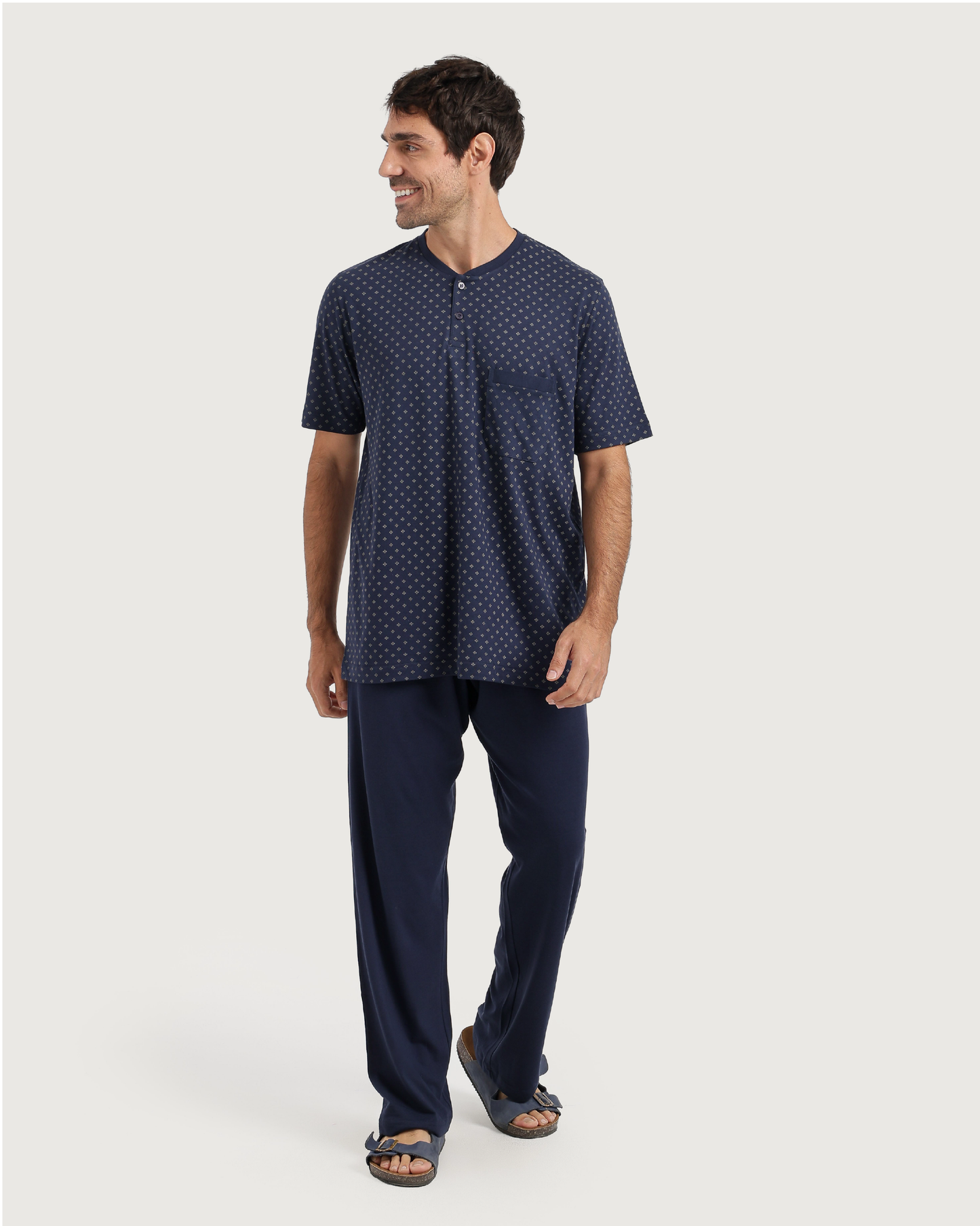 Man with an elegant classic look in a pajama with a distinctive geometric pattern
