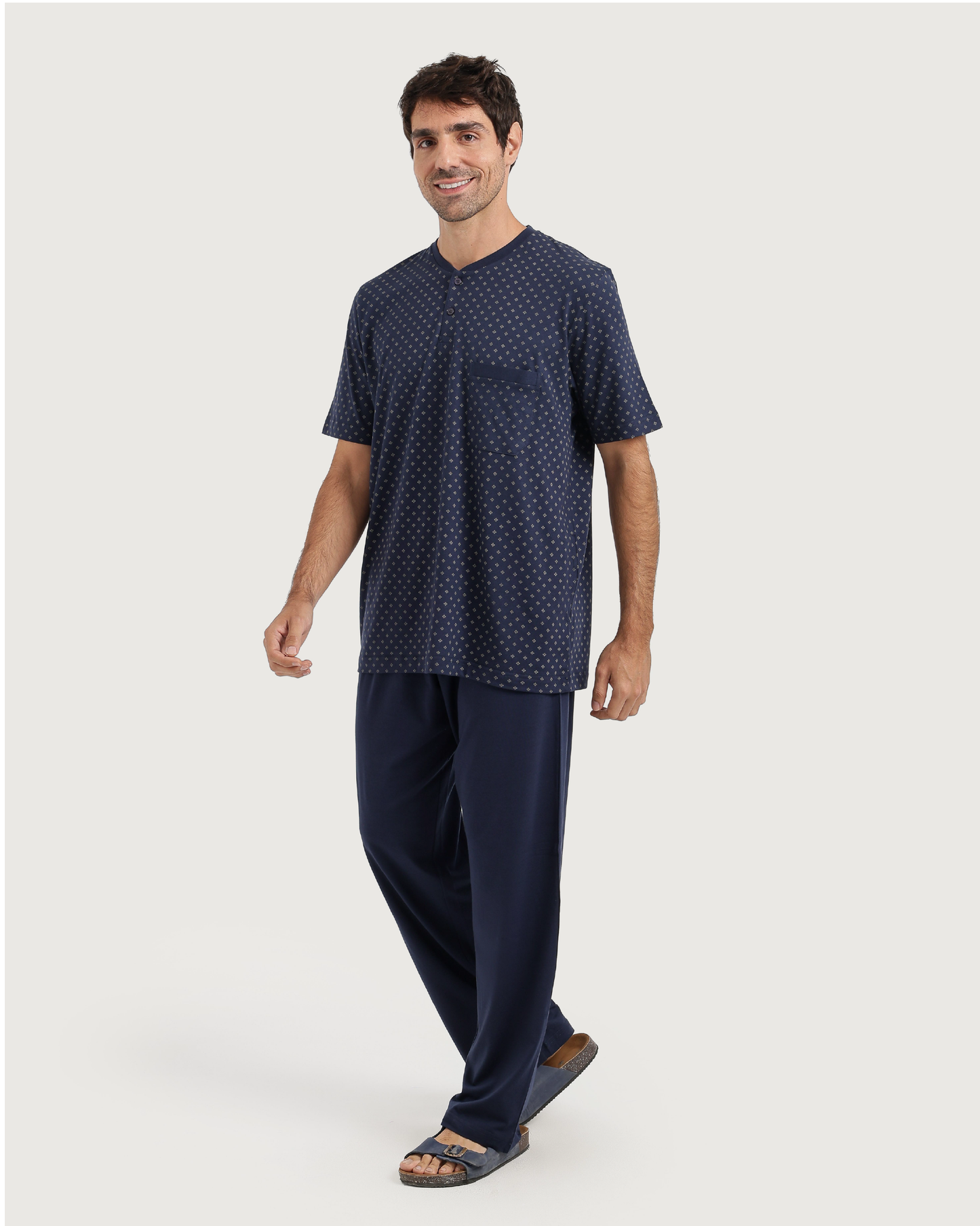Man with an elegant classic look in a pajama with a distinctive geometric pattern