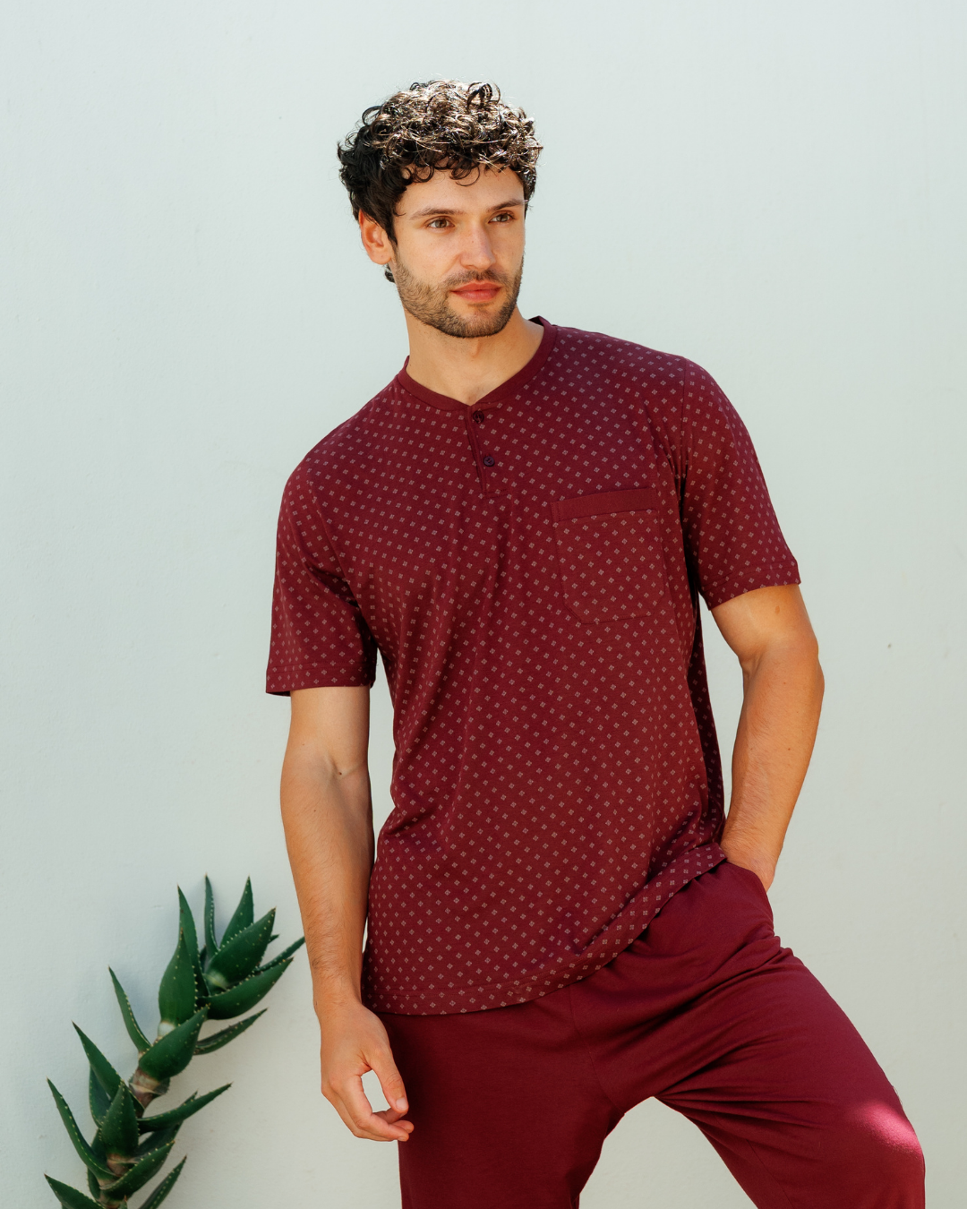 Man with an elegant classic look in a pajama with a distinctive geometric pattern