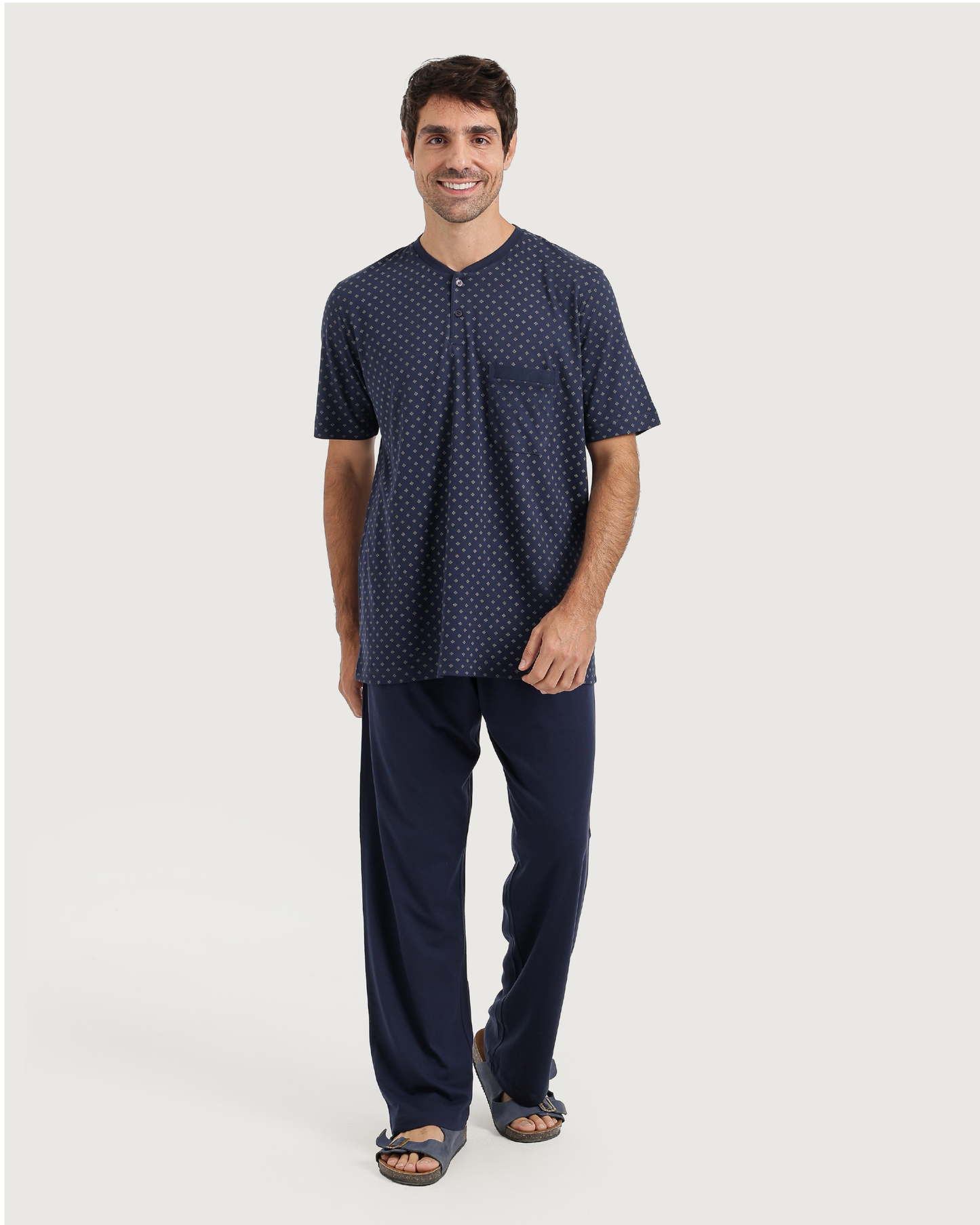 Man with an elegant classic look in a pajama with a distinctive geometric pattern