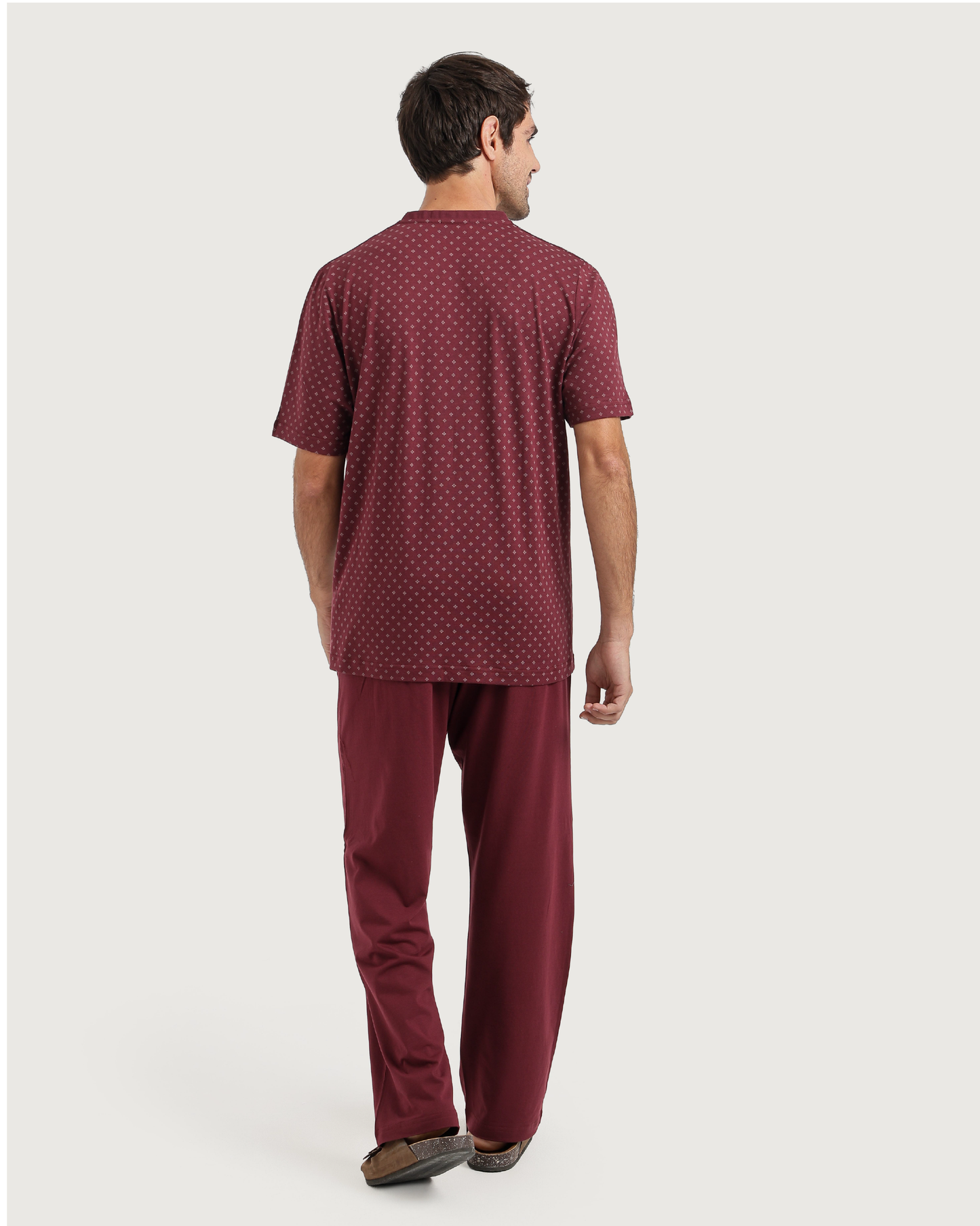 Man with an elegant classic look in a pajama with a distinctive geometric pattern