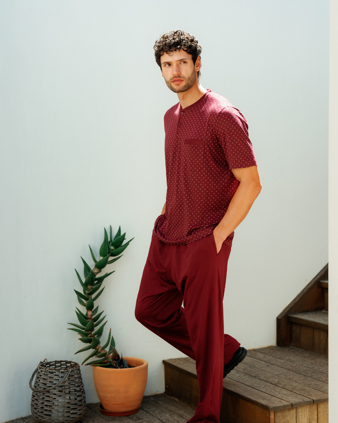 Man with an elegant classic look in a pajama with a distinctive geometric pattern