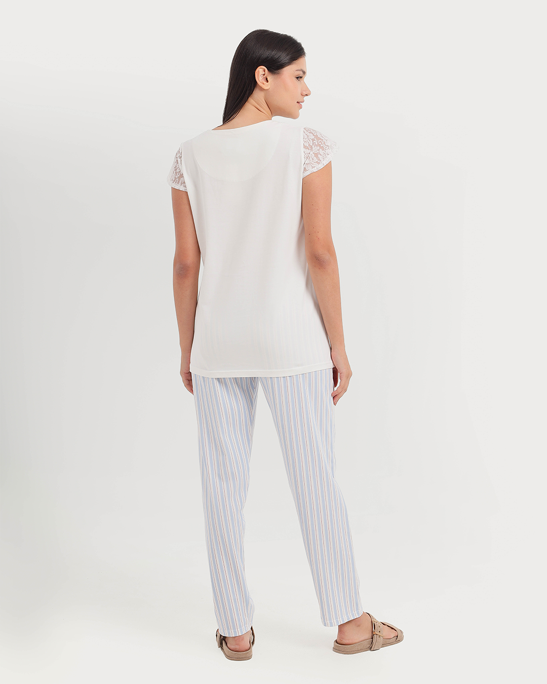 Pajama women's pants and dentures are worn