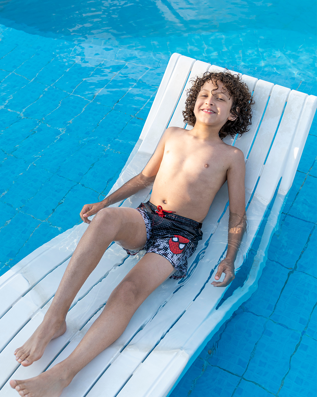 My boys' swimsuit, dotted with Spider-Man