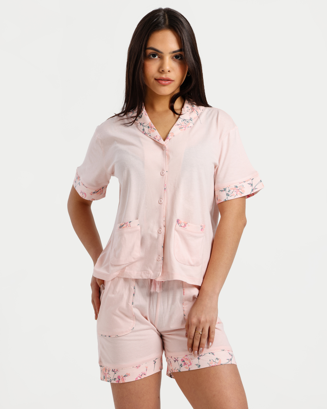 بيجاما حريمي بزراير ورد تجريدي