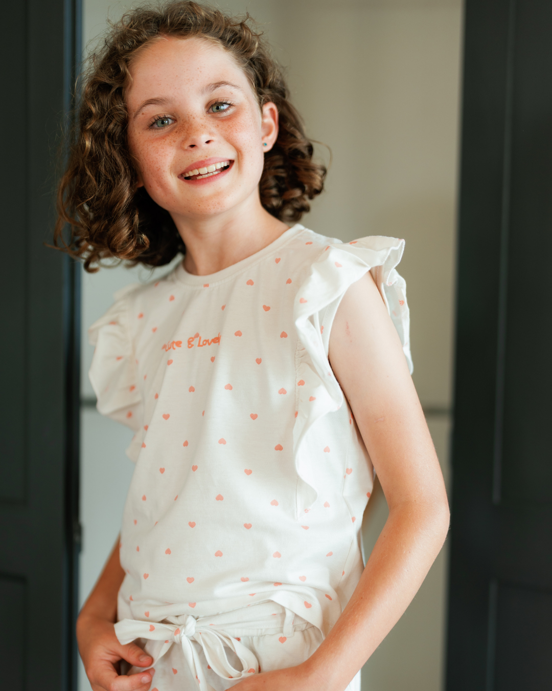 Cute girls pajamas with hearts pattern