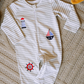 Baby romper with a nautical theme
