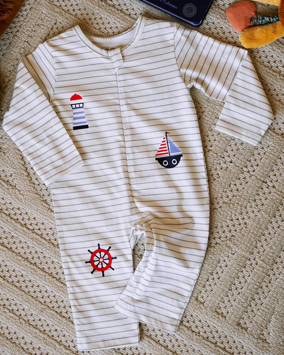 Baby romper with a nautical theme