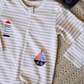 Baby romper with a nautical theme