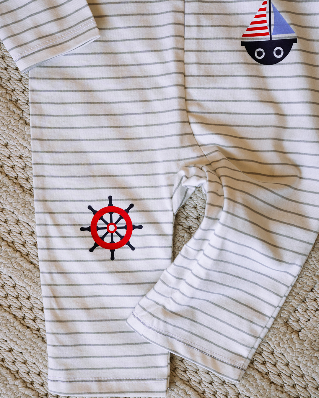 Baby romper with a nautical theme