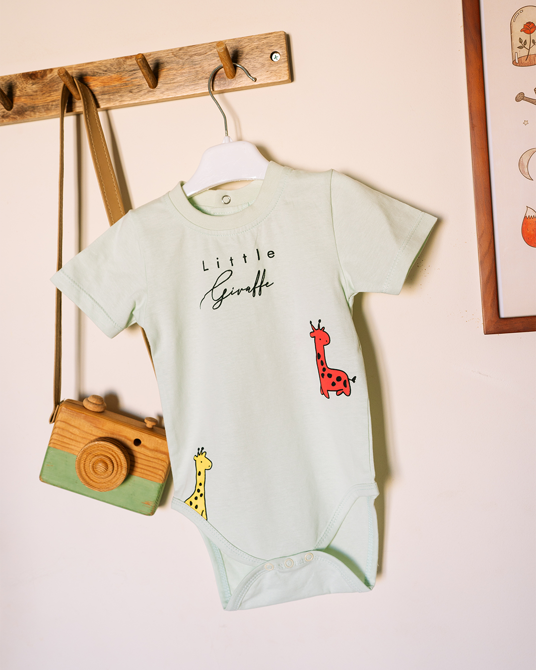 Children's romper with a cute giraffe print