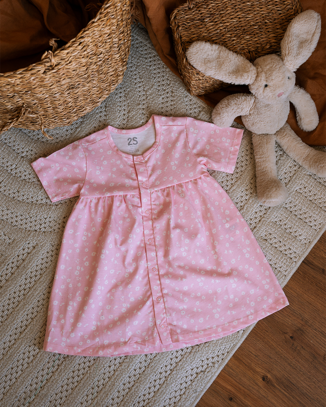 Baby girls dress in soft pink floral print