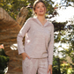 Women's pajamas with lace buttons on the chest and shoulder