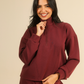 Enjoy winter outings in a soft women's set in dark colors