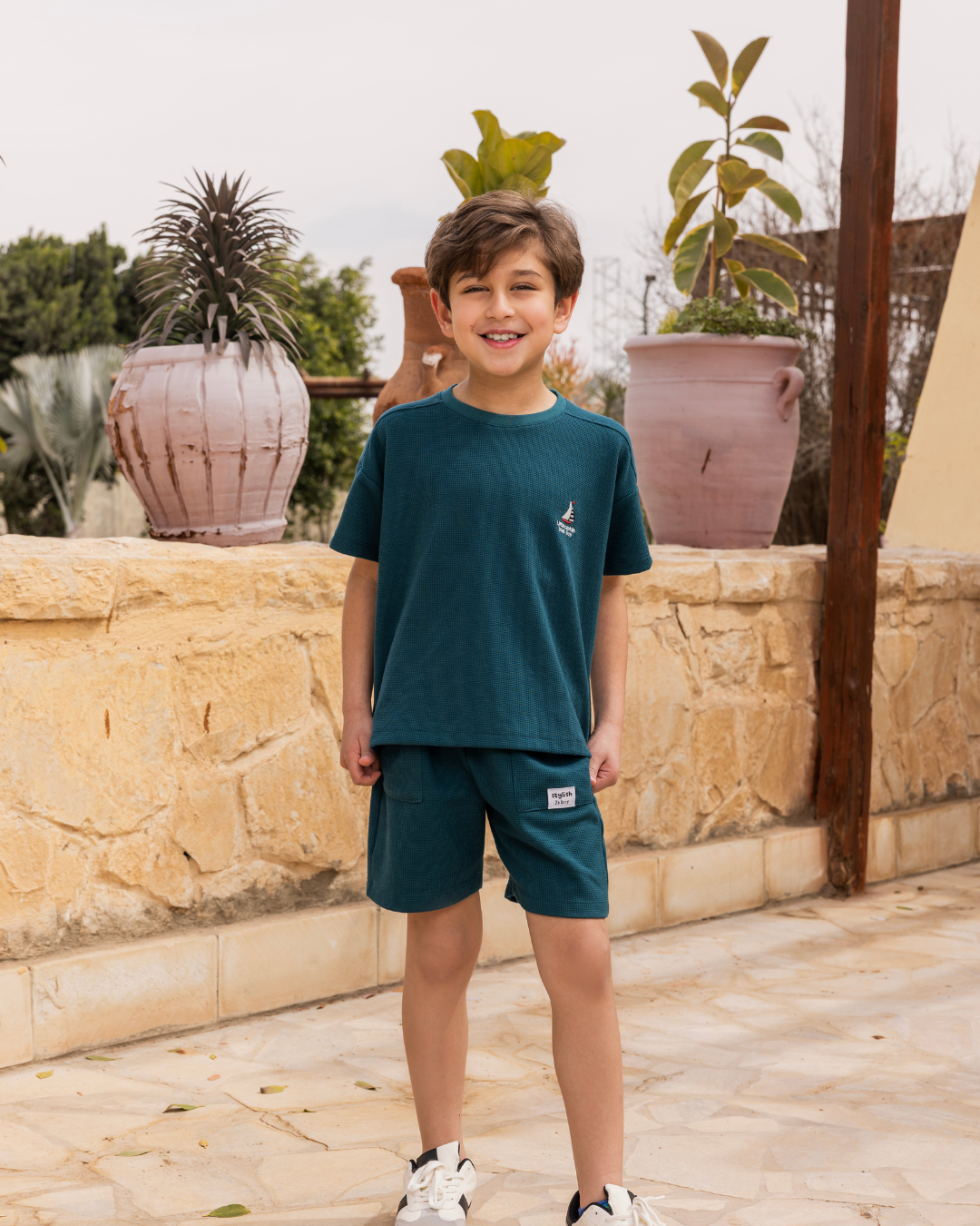 بيجاما شورت جاكارد و توب نص كُم الكابتن الصغير