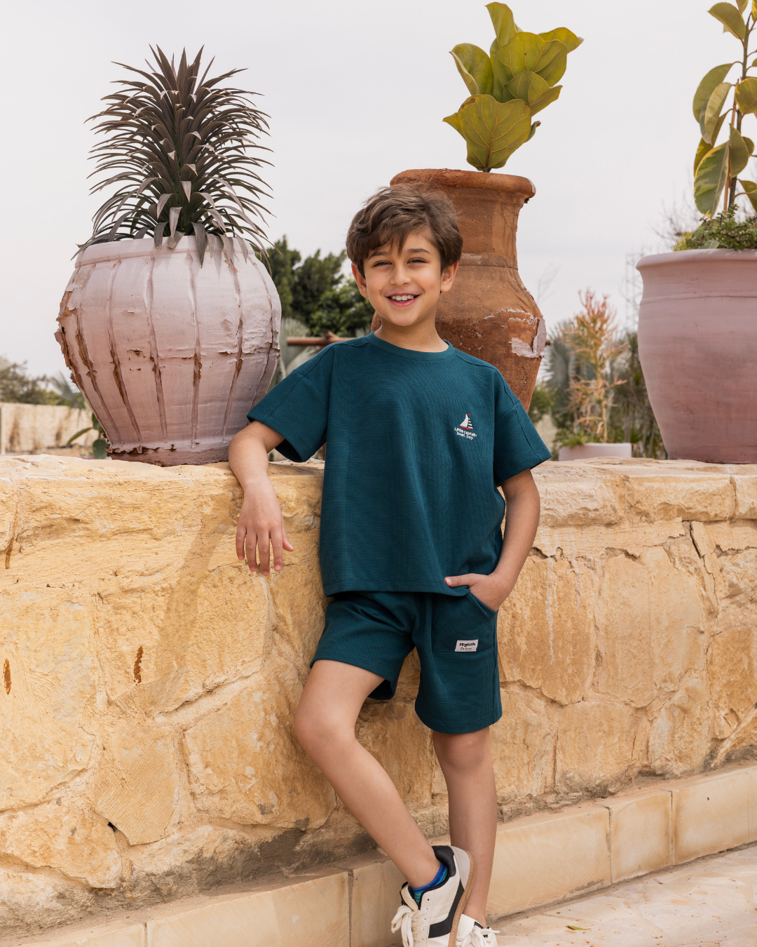 بيجاما شورت جاكارد و توب نص كُم الكابتن الصغير